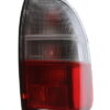 Lampa stop dreapta Mitsubishi L200 , varianta facelift transparenta, 2002-2007 .
